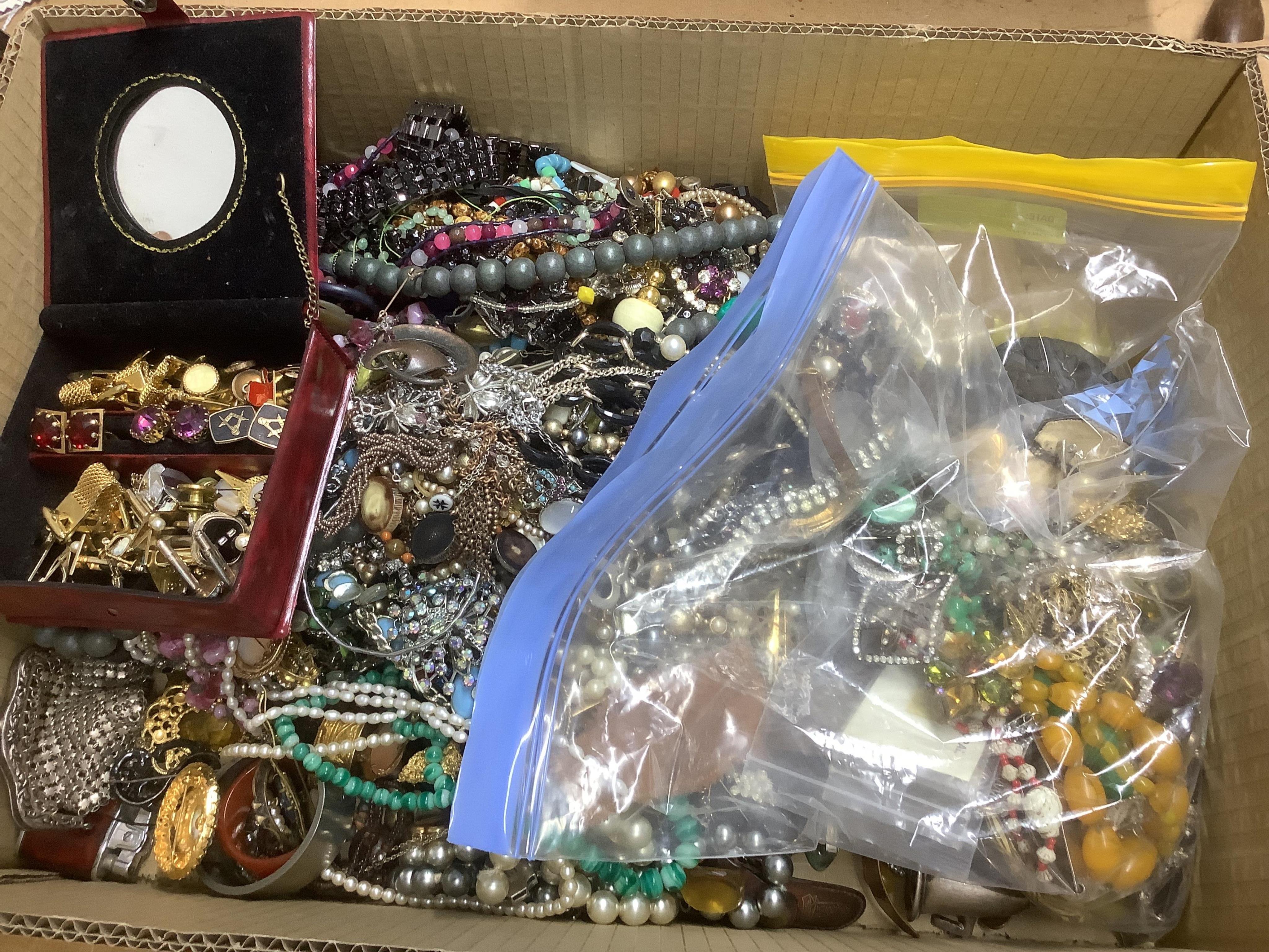 A large quantity of assorted costume jewellery including necklaces, cufflinks, brooches etc. including one part of a Arts & Crafts pewter and Ruskin enamel belt buckle by Norman & Ernest Spittle for the Guild Button and